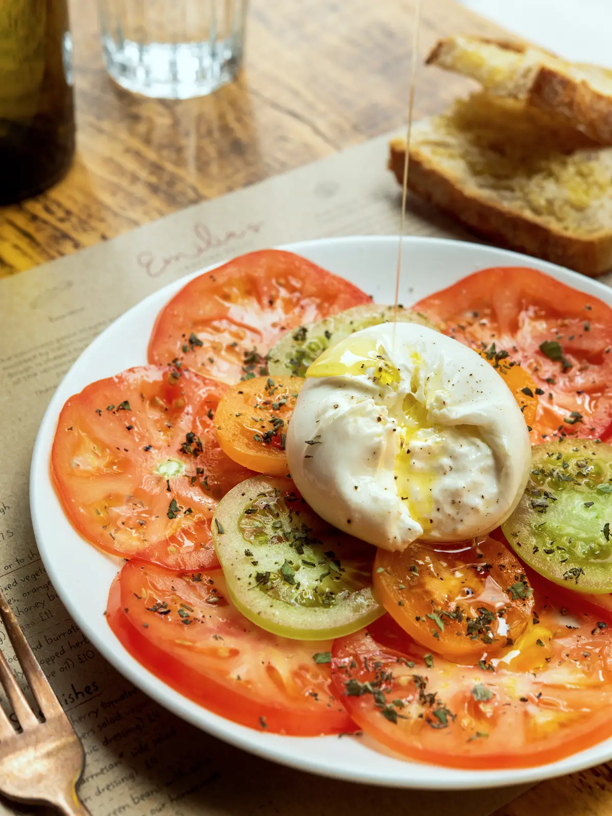 burrata salad heritage heirloom tomatoes extra virgin organic olive oil drizzle-1